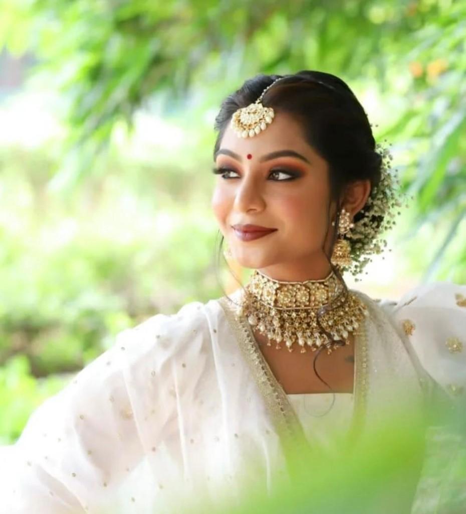 Soft bridal look in white attire with fresh day makeup by Nensi